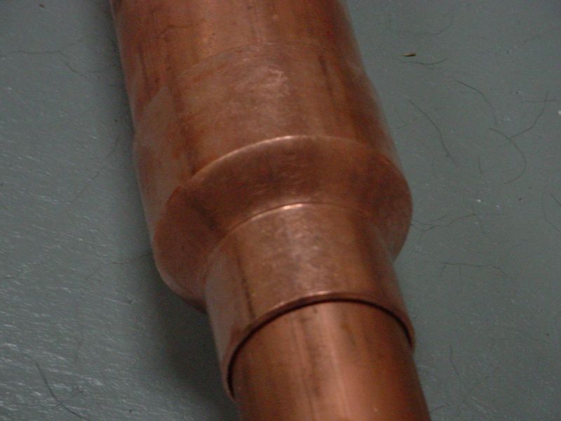 Reducer coupling between reflux and boiler